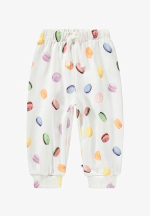 Pantalones blancos para niño pequeño con cintura y puños elásticos, decorados con patrones de macarons coloridos en tonos pastel.
