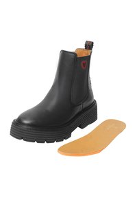 Stivaletto in pelle nera con pannelli elastici laterali, suola in gomma spessa, dettaglio a forma di cuore rosso e soletta removibile beige.