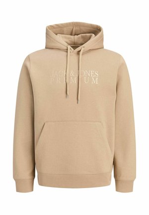 Beżowa bluza z kapturem i kieszenią z przodu, z białym haftem "Jack & Jones Premium" na piersi.