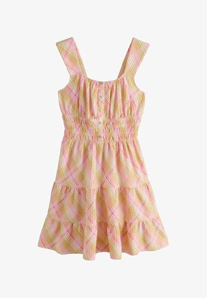 Ærmeløs kjole med brede stropper, pink og gul ternet mønster, smock-talje, knapper foran og lagdelt nederdel.