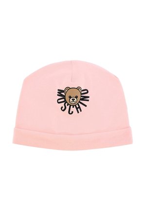 Bonnet en coton rose avec un ourlet roulé, affichant un graphique d'ours au centre entouré du texte noir "Moschino". Texture douce et flexible.