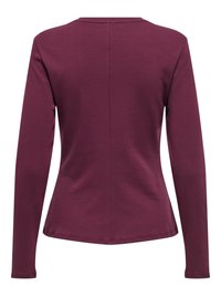 Vue arrière d'un haut ajusté à manches longues uni de couleur bordeaux foncé avec une couture verticale centrale et un ourlet légèrement évasé.