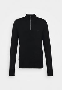 Schwarzer Langarmpullover mit einem halben Reißverschlusskragen, aus weichem Material, mit einem dezenten Logo auf der Brust und gerippten Bündchen.