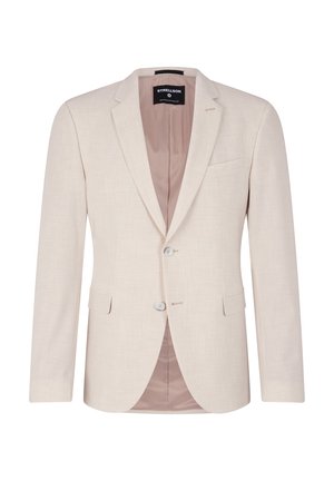 Blazer beige con revers a punta, chiusura con un bottone, due tasche frontali e una morbida fodera interna rosa. Finitura in tessuto testurizzato.