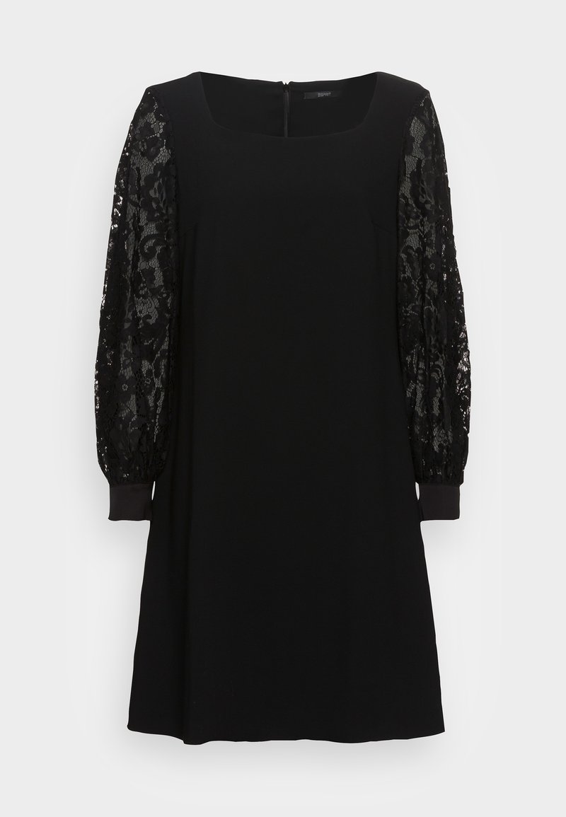 Robe noire mi-longue avec manches longues en dentelle transparente et encolure carrée, poignets ajustés et fermeture éclair au dos.