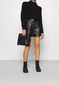 DRYKORN Strickpullover - black