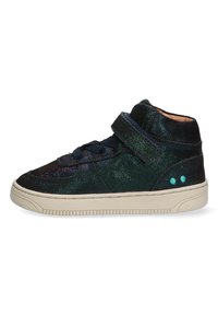 High-top sneaker made of iridescent dark green material, featuring a navy strap, blue accents, and a beige rubber sole with textured grip.