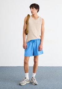 Nike Sportswear FINE - Treningo apatinė dalis - light photo blue