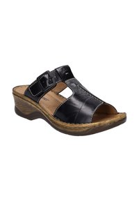 Infradito in pelle nera, aperte sulla punta, con cinturino regolabile dotato di fibbia, suola marrone texturizzata e dettagli cuciti. Design confortabile.