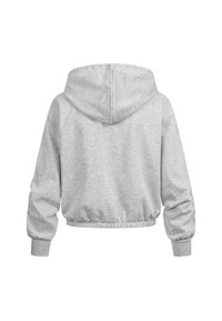 Haut de survêtement gris raccourci en tissu doux. Présente une capuche, une taille élastique et des manches amples. Pas de motifs ni d'accents visibles.