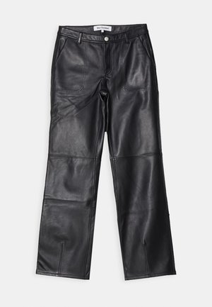 CORETTA - Leather trousers - black