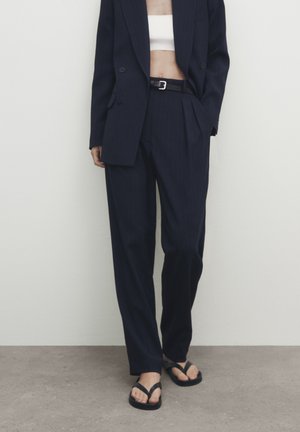 Spodnie materiałowe