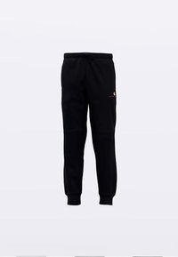 Pantalon de jogging noir à taille élastique, fabriqué en tissu doux. Doté d'un cordon de serrage et d'un petit logo de couleur contrastante sur la cuisse.