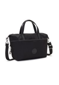 Borsa a mano nera in nylon con doppi manici superiori e tracolla staccabile, dotata di tasca frontale con zip, patch con logo e dettagli metallici.