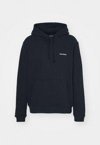 Must must-hallideega, millel on reguleeritav kapuuts, esimesed taskud ja "SALOMON" logo erakordselt valgel rinnal. Sisaldab ribatud varrukaid ja lõppu.