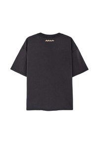 Czarny, luźny t-shirt wykonany z bawełny, z krótkimi rękawami i okrągłym dekoltem. Subtelny, brązowy wzór w zygzak na górnej części pleców.