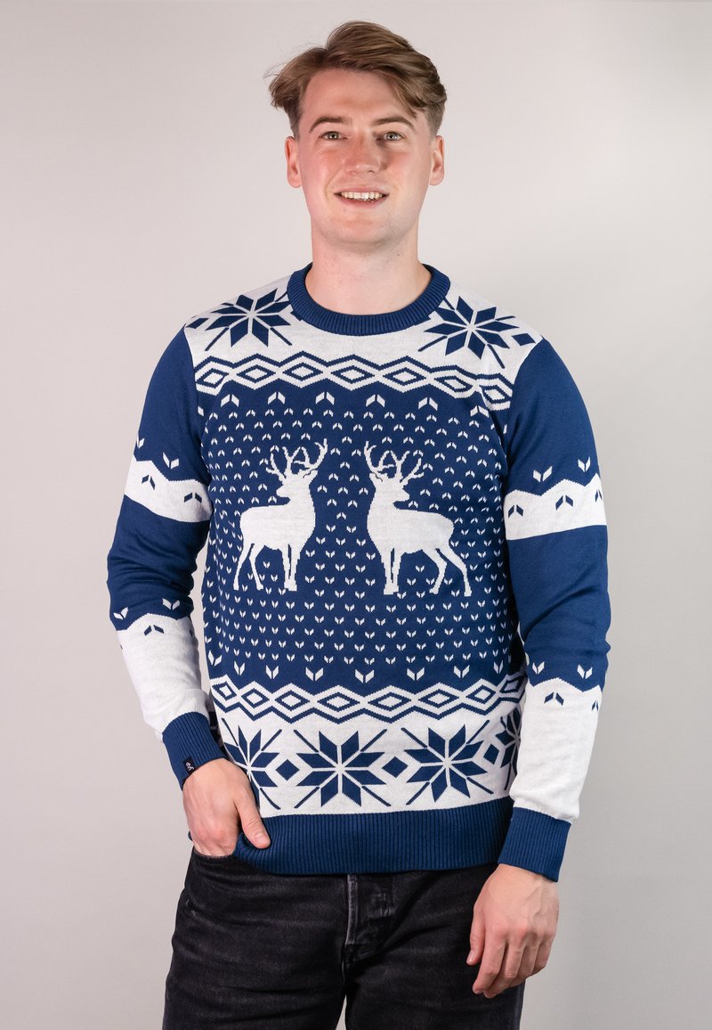Marineblauer Strickpullover mit weißen Rentier- und Schneeflockenmuster, mit gerippten Bündchen und Saum, im festlichen Weihnachtsdesign.