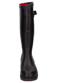 Brown rubber knee-high boot with a textured surface, contrasting red lining, logo detail on the side, and a rear pull tab for easy wear.
