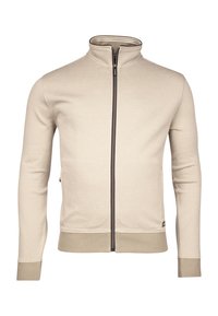 Beige zip-up jack met een hoge kraag, textuurstof, ribgebreide boorden en zoom, contrasterende rits en een zijzakdetail.