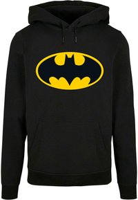 Felpa nera con cappuccio realizzata in tessuto, caratterizzata da un grande logo di Batman giallo e nero sulla parte anteriore. Include una tasca a marsupio e un cappuccio con cordoncino.