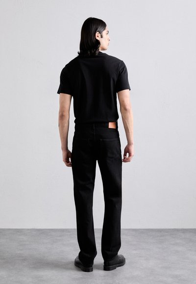 sandro STONEWASH - Relaxed fit jeans - noir