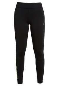 Czarne legginsy sportowe o wysokim stanie z dopasowanym krojem, z logo Calvin Klein na lewej udzie i żółtym pionowym napisem na dolnej prawej nodze.
