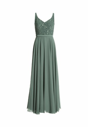 Langes grünes Kleid mit einem Spitzenoberteil und V-Ausschnitt, versehen mit einem fließenden Chiffonrock, der bis zum Boden reicht.