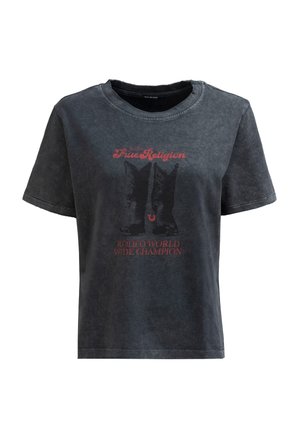 T-shirt en coton noir délavé avec manches courtes, col rond et un motif graphique de bottes de rodéo avec un texte en dessous.