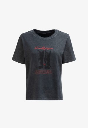 T-shirt en coton noir délavé avec manches courtes, col rond et un motif graphique de bottes de rodéo avec un texte en dessous.