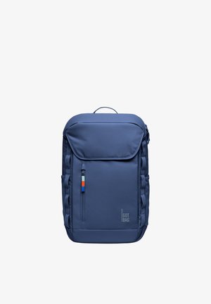 Suorakulmainen sininen reppu, jossa on yläluukku, etutasku vetoketjulla ja värillinen vetimet, sivulenkit sekä "GOT BAG" -logo alaoikealla.