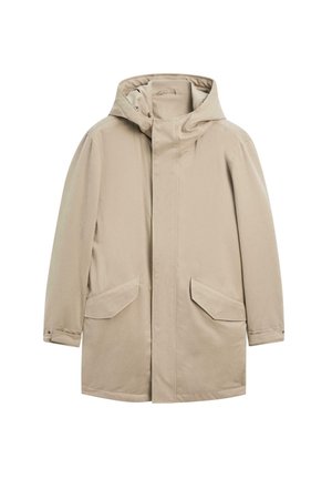 Beige waterproof coat with a hood, front snap closure, and two side pockets. Features a loose fit and smooth, slightly textured fabric.