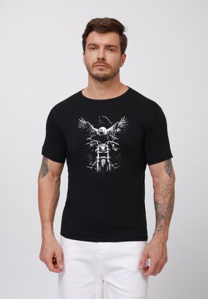 Black t-shirt made of cotton, featuring a white graphic of a motorcycle and an eagle with outstretched wings on the front.