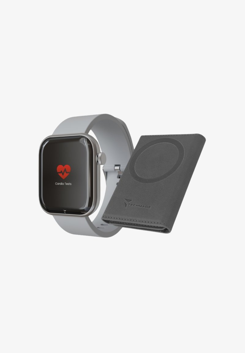 Smartwatch with a square black display, silver bezel, and gray silicone band, alongside a gray wallet featuring a circular magnetic accent.