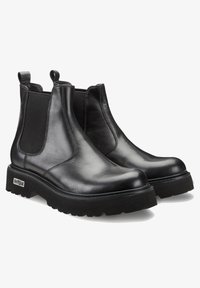 Stivali Chelsea neri in pelle con pannelli elastici laterali, punta rotonda e suola in gomma spessa. Presenta un piccolo logo metallico sul lato.