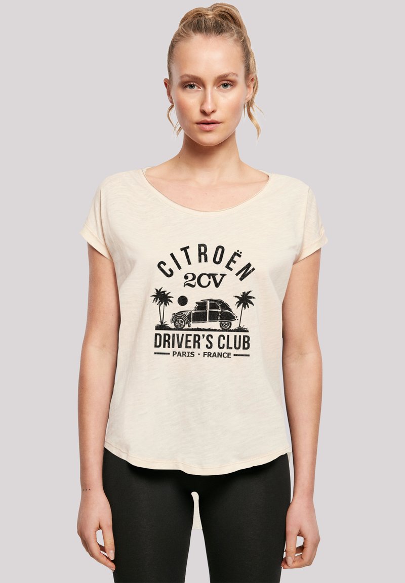 Cream-colored, short-sleeve T-shirt with a round neckline and a vintage Citroën 2CV graphic. Features palm trees, "DRIVER'S CLUB," and location text.