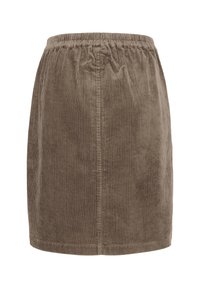 Jupe droite en velours côtelé marron avec taille élastique et texture côtelée verticale, longueur au genou, sur fond blanc uni.