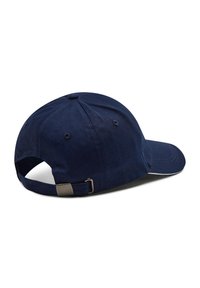 Mörkblå baseballkeps i bomull, med en böjd skärm, justerbar rem och en strukturerad yta med stickade detaljer.