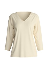 Lichtbeige v-hals tuniek, met driekwart mouwen en een zachte, gladde stof. Eenvoudig ontwerp zonder patronen of versieringen.