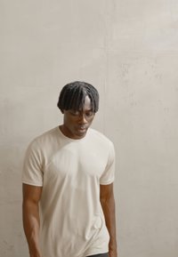 Puma PERFORMANCE TEE - Camiseta deportiva - putty