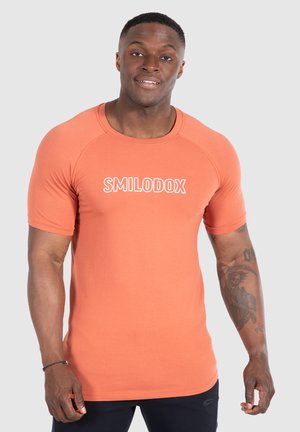 TIMMY PERFORMANCE SPORT - Tekninen t-paita - terakotta