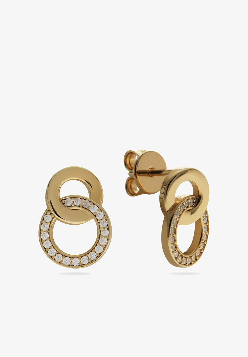 Oorbellen met goudkleurige stekers en een ontwerp van elkaar overlappende cirkels, bestaande uit één effen cirkel en één cirkel bezet met kleine witte kristallen.
