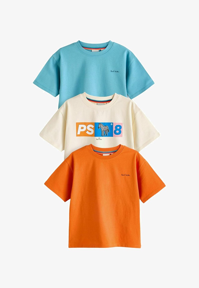 Három rövid ujjú póló: egy türkiz, egy krémszínű kék és narancs grafikával, valamint egy narancsszínű. Puha pamut anyag.