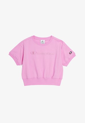 T-shirt corta rosa Champion con maniche corte, logo ricamato sul petto e piccolo patch logo sulla manica sinistra.