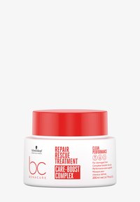Barattolo bianco con coperchio rosso, etichettato "Repair Rescue Treatment Care-Boost Complex", contiene 200 ml; progettato per capelli danneggiati.