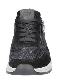 Black athletic shoe featuring suede and mesh materials, textured patterns, lace-up closure, and a side zipper detail with a rubber sole.