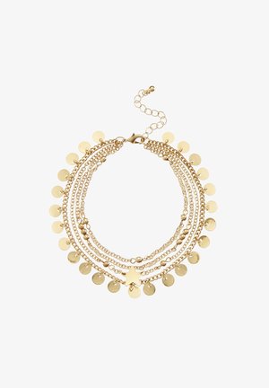 Gold multi-layered necklace featuring chains, round pendants, and a star charm. Smooth texture with shiny finish and adjustable clasp.