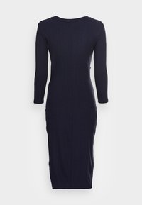Marinblå ribbad klänning med långa ärmar och rund hals, som har en smal passform som avsmalnar vid midjan och faller under knäet.