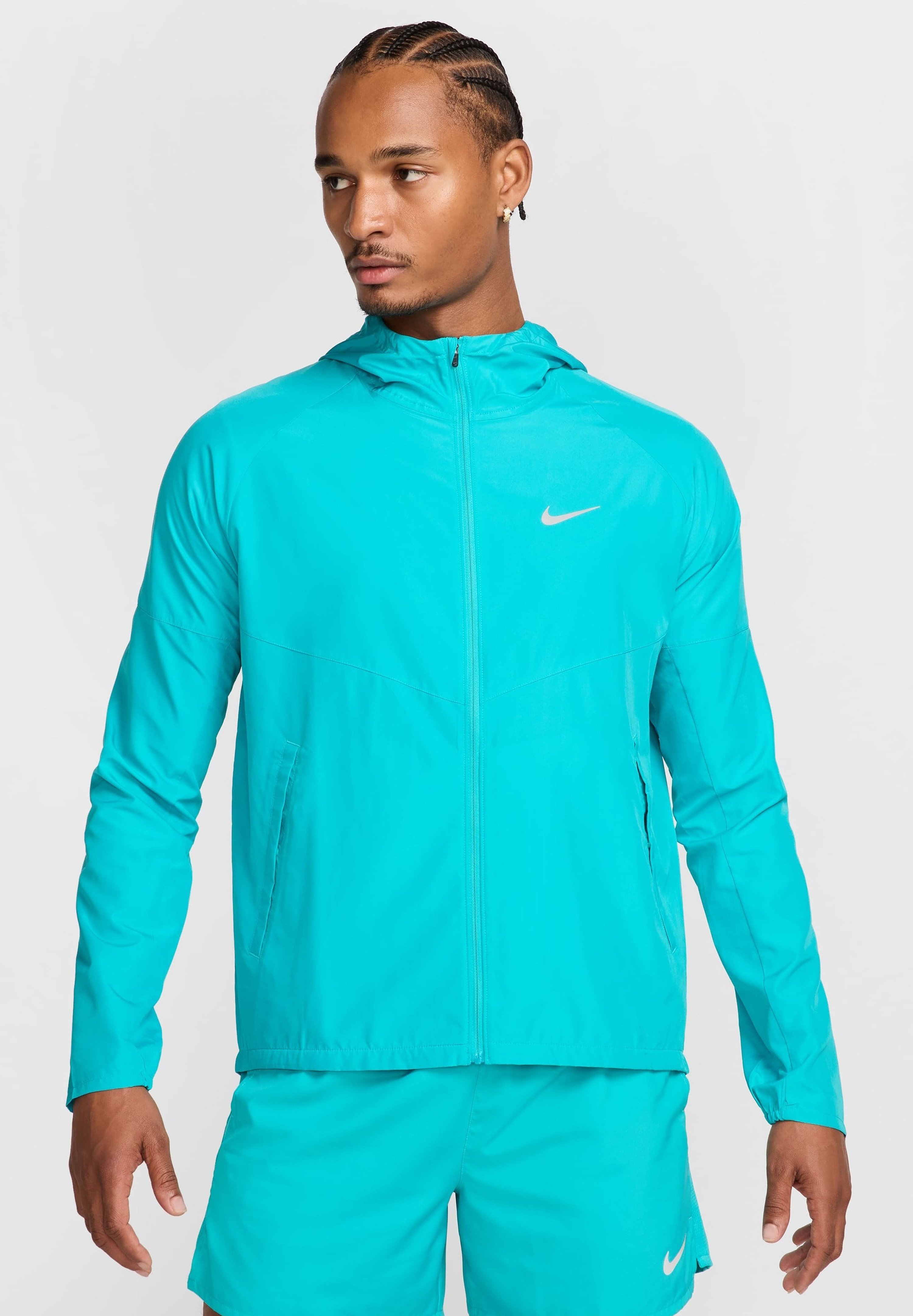 turquoise nike windbreaker