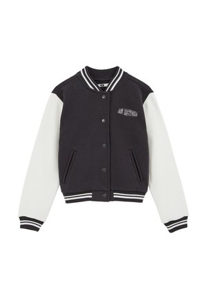 Black and white varsity jacket featuring a solid black body, white sleeves, striped ribbed cuffs, and an embroidered "AU REVOIR" detail.