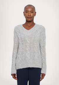 Light gray cable-knit sweater with a v-neck, long sleeves, and ribbed hem. Made from a soft, textured material that appears cozy.